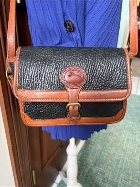 Dooney & Bourke All weather Leather Crossbody bag  thick leather black/brown EUC